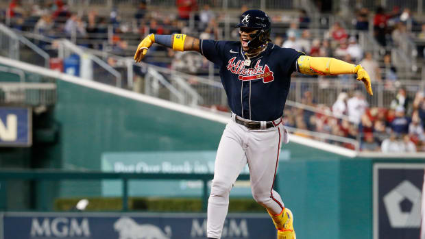 Sep 22, 2023; Washington, District of Columbia, USA; Atlanta Braves right fielder Ronald Acuna Jr. (13) celebrates while rounding the bases after hitting his 40th home run of the season against the Washington Nationals during the first inning at Nationals Park.