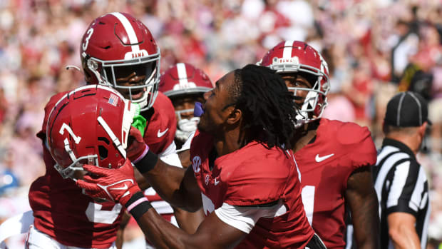 Sep 23, 2023; Tuscaloosa, Alabama, USA; Alabama Crimson Tide wide receiver Ja'Corey Brooks (7) celebrates with teammates after blocking a Mississippi Rebels punt during the first half at Bryant-Denny Stadium. Mandatory Credit: Gary Cosby Jr.-USA TODAY Sports