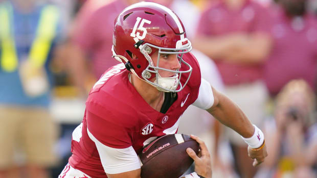 Sep 23, 2023; Tuscaloosa, Alabama, USA; Alabama Crimson Tide quarterback Ty Simpson (15) scrambles for a two point conversion against the Mississippi Rebels during the third quarter at Bryant-Denny Stadium.