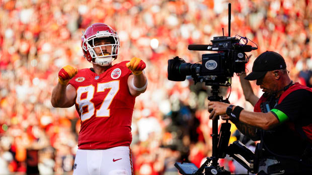 Sep 24, 2023; Kansas City, Missouri, USA; Kansas City Chiefs tight end Travis Kelce (87) celebrates after scoring at touchdown during the second half against the Chicago Bears at GEHA Field at Arrowhead Stadium. Mandatory Credit: Jay Biggerstaff-USA TODAY Sports