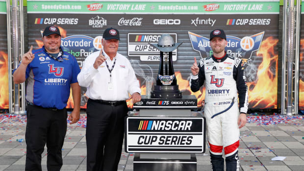 From left to right: Crew chief Rudy Fugle, NASCAR Hall of Famer team owner Rick Hendrick and William Byron celebrate Hendrick Motorsports' 300th NASCAR Cup Series win after capturing Sunday's Autotrader EchoPark Automotive 400 at Texas Motor Speedway. (Photo by Chris Graythen/Getty Images)