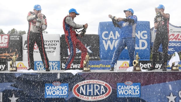 NHRA Charlotte winners (from left): Doug Kalitta (Top Fuel), Bob Tasca III (Funny Car), Greg Anderson (Pro Stock) and Gaige Herrera (Pro Stock Motorcycle) celebrate their respective wins in Sunday's playoff race near Charlotte, N.C. Photo courtesy NHRA.