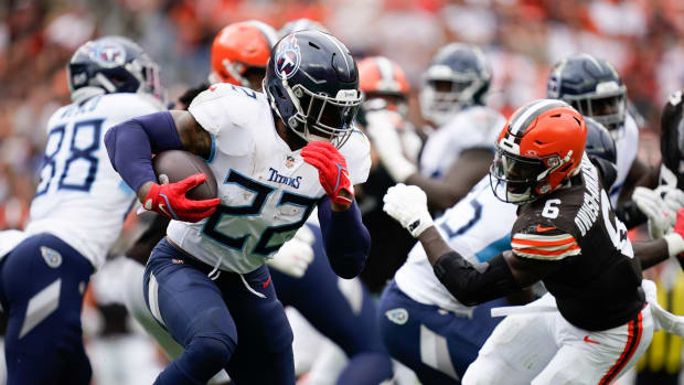 Tennessee Titans running back Derrick Henry (22) runs the ball during the third quarter against the Cleveland Browns.