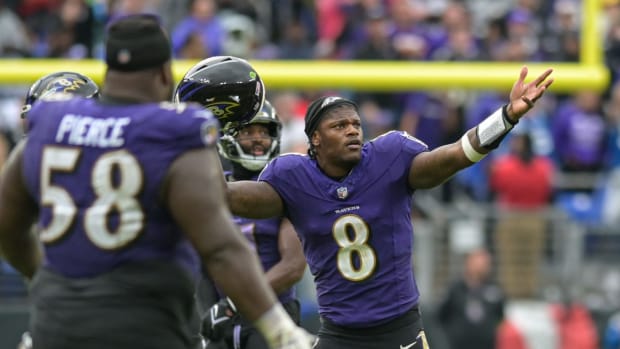 Sep 24, 2023; Baltimore, Maryland, USA;Baltimore Ravens quarterback Lamar Jackson (8) reacts when a fourth down play is reviewed on the jumbotron during overt time against the Indianapolis Colts at M&T Bank Stadium. Mandatory Credit: Tommy Gilligan-USA TODAY Sports