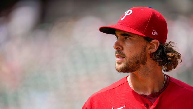 Sep 20, 2023; Cumberland, Georgia, USA; Philadelphia Phillies starting pitcher Aaron Nola (27) leaves the field during the game against the Atlanta Braves during the first inning at Truist Park. Mandatory Credit: Dale Zanine-USA TODAY Sports