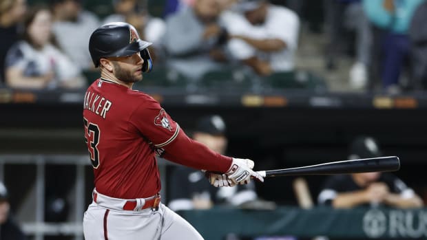 Arizona Diamondbacks first baseman Christian Walker (53) triples into the right center field gap to give his team a 7-4 lead against the Chicago White Sox.