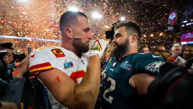 Chiefs tight end Travis Kelce and Eagles center Jason Kelce after Kansas City's 38-35 win over Philadelphia in Super Bowl LVII on Feb. 12, 2023.
