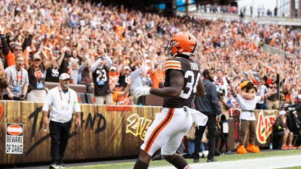 Sep 24, 2023; Cleveland, Ohio, USA; Cleveland Browns running back Jerome Ford (34) runs through the end zone for a touchdown during the second quarter against the Tennessee Titans at Cleveland Browns Stadium. Mandatory Credit: Scott Galvin-USA TODAY Sports