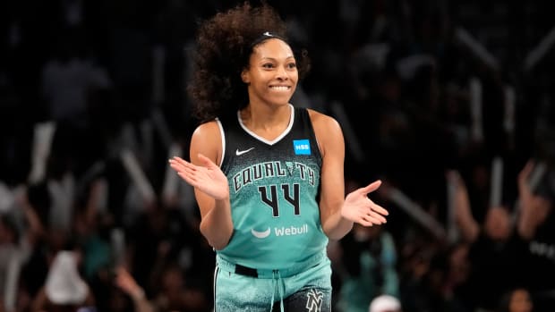 New York Liberty forward Betnijah Laney smiles after hitting a 3-pointer against the Connecticut Sun during the WNBA playoffs.