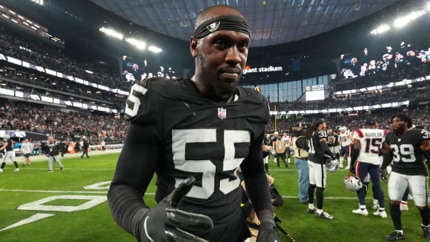 Raiders defensive end Chandler Jones looks on after a game.