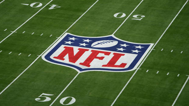 An NFL logo painted on a field before the Super Bowl.