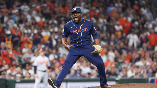 Sep 18, 2023; Houston, Texas, USA; Houston Astros relief pitcher Hector Neris (50) reacts after getting a strikeout during the eighth inning against the Baltimore Orioles at Minute Maid Park. Mandatory Credit: Troy Taormina-USA TODAY Sports