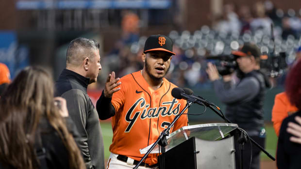 SF Giants second baseman Thairo Estrada (39) addresses the crowd after winning the WIllie Mac award before the game against the Los Angeles Dodgers at Oracle Park.