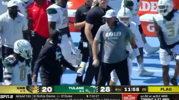 UAB head football coach Trent Dilfer yells at an assistant coach after a penalty against his team.