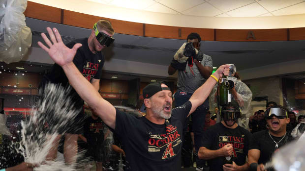 Diamondbacks manager Torey Lovullo starts the celebration in the clubhouse after his team clinched a Wild Card berth on September 29, 2023.