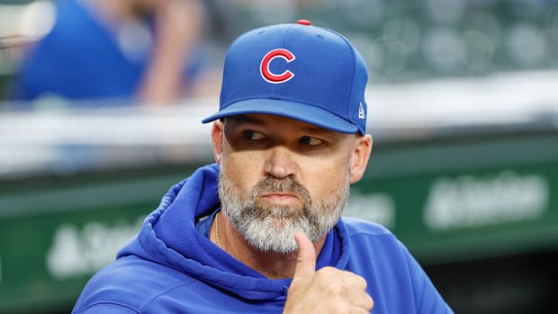 Sep 7, 2023; Chicago, Illinois, USA; Chicago Cubs manager David Ross (3) looks on from the dugout before a baseball game against the Arizona Diamondbacks at Wrigley Field. Mandatory Credit: Kamil Krzaczynski-USA TODAY Sports