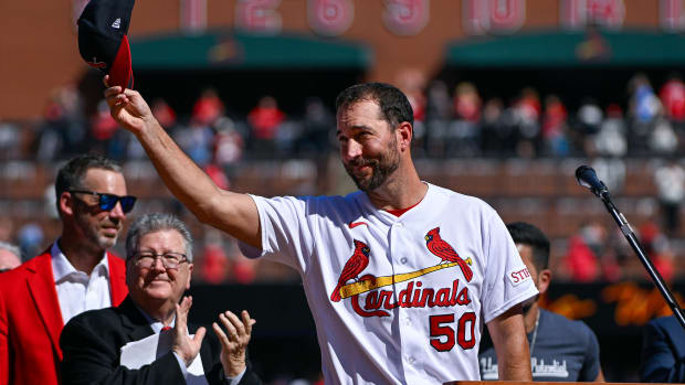 Oct 1, 2023; St. Louis, Missouri, USA; St. Louis Cardinals starting pitcher Adam Wainwright (50) tips his cap during his retirement ceremony before a game against the Cincinnati Reds at Busch Stadium.