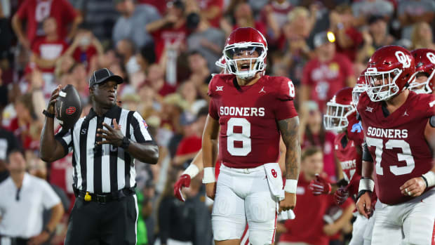 Oklahoma Sooners quarterback Dillon Gabriel (8) celebrates with teammates after scoring a touchdown during the first half against the Iowa State Cyclones at Gaylord Family-Oklahoma Memorial Stadium.