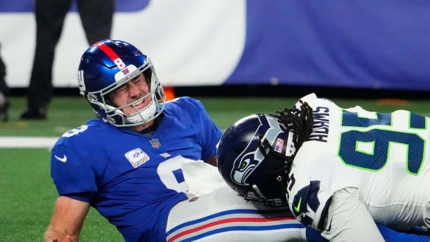 Seahawks defensive tackle Myles Adams sacks Giants quarterback Daniel Jones during Seattle's 24-3 win over New York on Oct. 2, 2023.