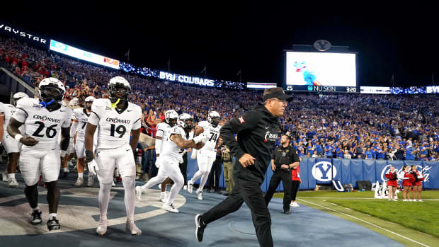 Cincinnati Bearcats head coach Scott Satterfield takes the field with the team prior to a college football game between the Brigham Young Cougars and the Cincinnati Bearcats, Friday, Sept. 29, 2023, at LaVell Edwards Stadium in Provo, Utah.