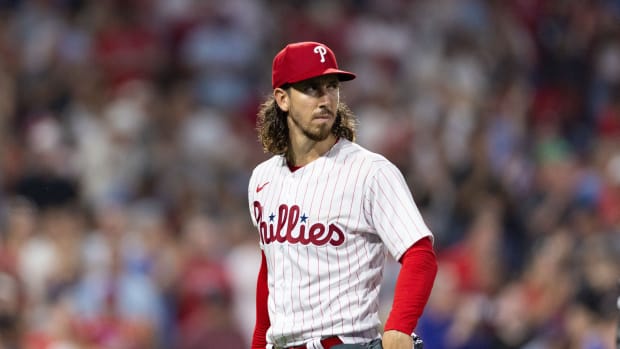 Aug 9, 2023; Philadelphia, Pennsylvania, USA; Philadelphia Phillies starting pitcher Michael Lorenzen (22) glances over his shoulder after an out in the eighth inning against the Washington Nationals at Citizens Bank Park. Mandatory Credit: Bill Streicher-USA TODAY Sports