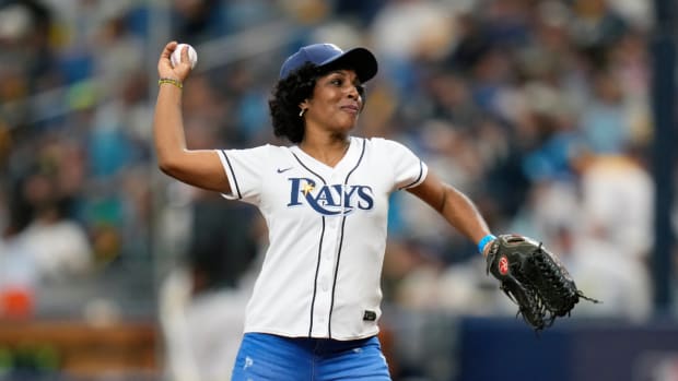 Rays outfielder Randy Arozarena’s mother, Sandra Gonzalez, throws out the first pitch before the wildcard game vs. the Rangers.