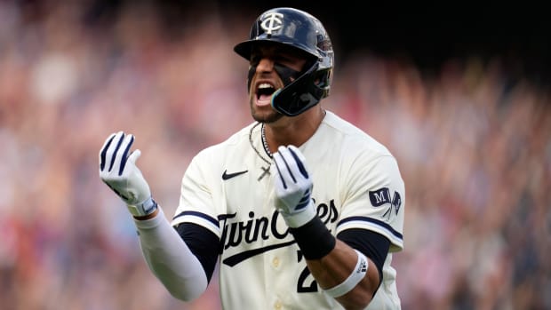 Twins designated hitter Royce Lewis celebrates after hitting a home run against the Blue Jays in the playoffs.