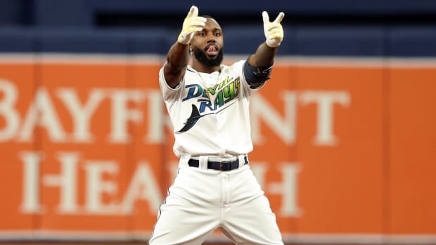 Oct 3, 2023; St. Petersburg, Florida, USA; Tampa Bay Rays left fielder Randy Arozarena (56) reacts after his double against the Texas Rangers in the third inning during game one of the Wildcard series for the 2023 MLB playoffs at Tropicana Field. Mandatory Credit: Kim Klement Neitzel-USA TODAY Sports