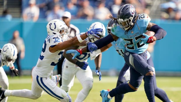 Tennessee Titans running back Derrick Henry (22) runs past Indianapolis Colts safety Julian Blackmon (32) during the fourth quarter at Nissan Stadium Sunday, Oct. 23, 2022, in Nashville, Tenn. Nfl Indianapolis Colts At Tennessee Titans