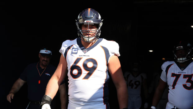 Denver Broncos offensive tackle Mike McGlinchey (69) takes the field before the game against the Chicago Bears at Soldier Field.