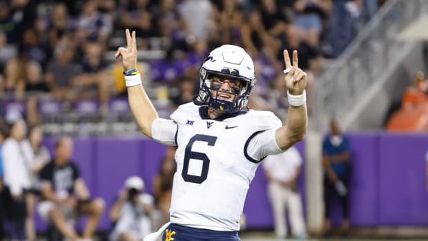 Sep 30, 2023; Fort Worth, Texas, USA; West Virginia Mountaineers quarterback Garrett Greene (6) reacts after winning the game against the TCU Horned Frogs at Amon G. Carter Stadium. Mandatory Credit: Tim Heitman-USA TODAY Sports  