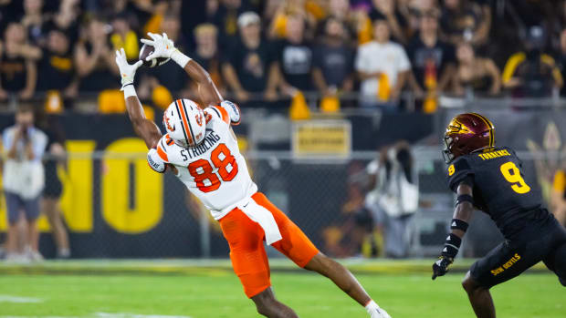 Sep 9, 2023; Tempe, Arizona, USA; Oklahoma State Cowboys wide receiver De'Zhaun Stribling (88) catches a pass against the Arizona State Sun Devils in the first half at Mountain America Stadium. Mandatory Credit: Mark J. Rebilas-USA TODAY Sports