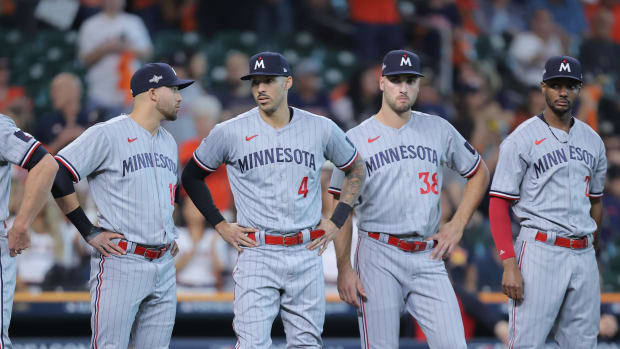 Oct 7, 2023; Houston, Texas, USA; Minnesota Twins shortstop Carlos Correa (4) talks with teammates before ether game against the Houston Astros during game one of the ALDS for the 2023 MLB playoffs at Minute Maid Park. Credit: Erik Williams-USA TODAY Sports