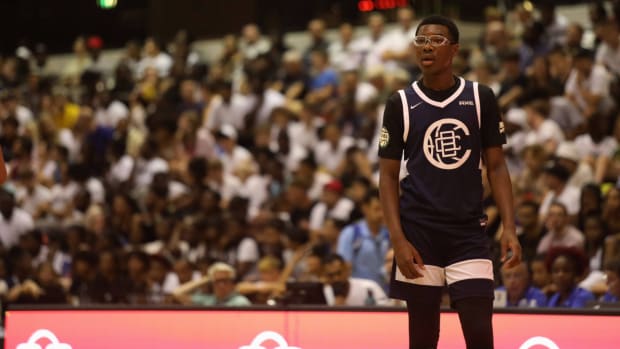Bryce James, son of LeBron James, plays a club basketball game in London in 2022.