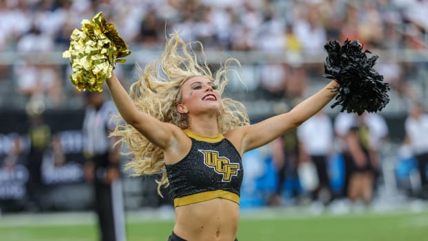 Sep 30, 2023; Orlando, Florida, USA; UCF Knights cheer team preform during the second half against the Baylor Bears at FBC Mortgage Stadium. Mandatory Credit: Mike Watters-USA TODAY Sports  
