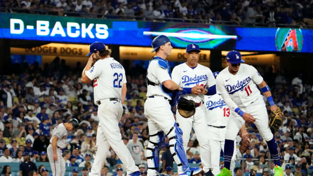 Oct 7, 2023; Los Angeles, CA, USA; Los Angeles Dodgers starting pitcher Clayton Kershaw (22) leaves the game after allowing the Arizona Diamondbacks to score six runs in the first inning during Game 1 of the NLDS at Dodger Stadium.