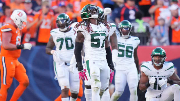 Oct 8, 2023; Denver, Colorado, USA; New York Jets linebacker C.J. Mosley (57) celebrates a sack in the second half against the Denver Broncos at Empower Field at Mile High. Mandatory Credit: Ron Chenoy-USA TODAY Sports  