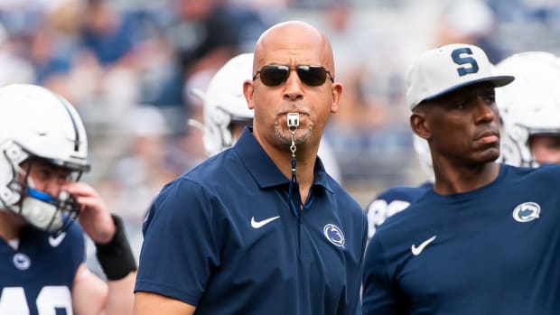 Penn State coach James Franklin guides the Nittany Lions during warmups before their game against Delaware.