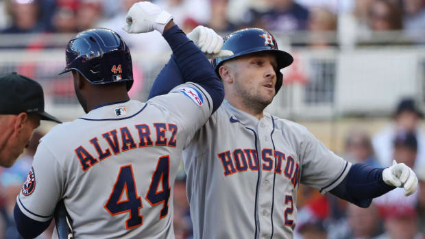 Astros third baseman Alex Bregman, right, celebrates a home run with Yordan Alvarez, left, in the fifth inning against the Minnesota Twins during game 3 of the 2023 ALDS
