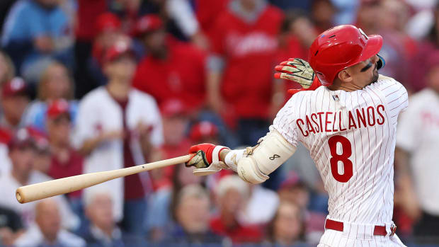 Oct 11, 2023; Philadelphia, Pennsylvania, USA; Philadelphia Phillies right fielder Nick Castellanos (8) hits a solo home run during the third inning against the Atlanta Braves in game three of the NLDS for the 2023 MLB playoffs at Citizens Bank Park. Mandatory Credit: Bill Streicher-USA TODAY Sports