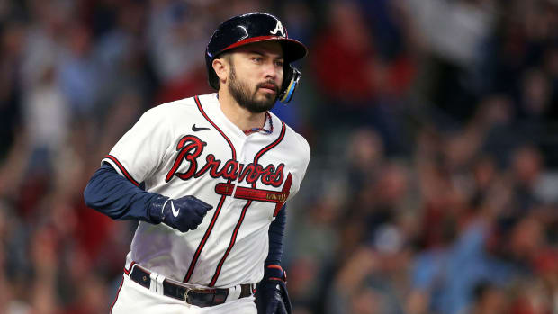 Braves catcher Travis d'Arnaud runs the bases after homering during Atlanta's 5-4 win over the Phillies in Game 2 of the NLDS on Oct. 9, 2023.