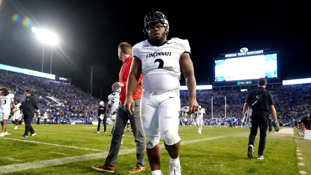 Cincinnati Bearcats defensive lineman Dontay Corleone (2) and the Cincinnati Bearcats walk off the field at the conclusion of a college football game between the Brigham Young Cougars and the Cincinnati Bearcats, Saturday, Sept. 30, 2023, at LaVell Edwards Stadium in Provo, Utah.