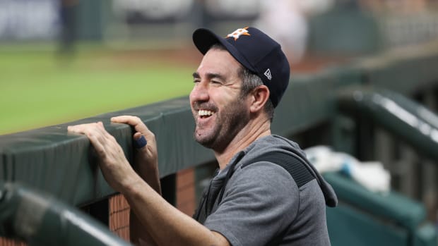 Oct 1, 2022; Houston, Texas, USA; Houston Astros starting pitcher Justin Verlander (35) smiles in the dugout during the third inning against the Tampa Bay Rays at Minute Maid Park. Mandatory Credit: Troy Taormina-USA TODAY Sports