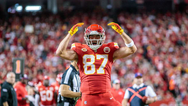 Oct 12, 2023; Kansas City, Missouri, USA; Kansas City Chiefs tight end Travis Kelce (87) celebrates after a play during the second quarter against the Denver Broncos at GEHA Field at Arrowhead Stadium. Mandatory Credit: William Purnell-USA TODAY Sports  