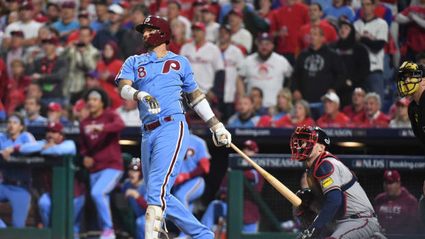Oct 12, 2023; Philadelphia, Pennsylvania, USA; Philadelphia Phillies right fielder Nick Castellanos (8) hits a solo home run against the Atlanta Braves during the fourth inning during game four of the NLDS for the 2023 MLB playoffs at Citizens Bank Park. Mandatory Credit: Eric Hartline-USA TODAY Sports