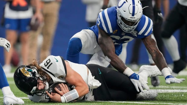 Indianapolis Colts linebacker Shaquille Leonard (53) covers Jacksonville Jaguars quarterback Trevor Lawrence (16) as he goes to the turf Sunday, Sept. 10, 2023, during a game against the Jacksonville Jaguars at Lucas Oil Stadium in Indianapolis.  