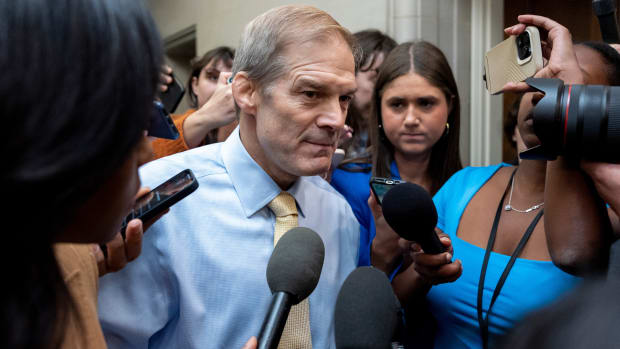 Jim Jordan, R-Ohio, speaks to reporters after departing from a GOP caucus meeting working to formally elect a new speaker of the House.