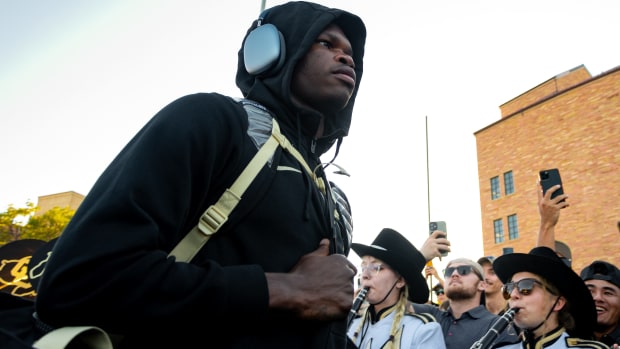 CU football's two-way super star player Travis Hunter is cheered on by fans during the Buff Walk before the Rocky Mountain Showdown at Folsom Field on Saturday Sept. 16, 2023 in Boulder, Colo.