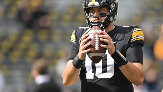 Oct 7, 2023; Iowa City, Iowa, USA; Iowa Hawkeyes quarterback Deacon Hill (10) warms up before the game against the Purdue Boilermakers at Kinnick Stadium. Mandatory Credit: Jeffrey Becker-USA TODAY Sports