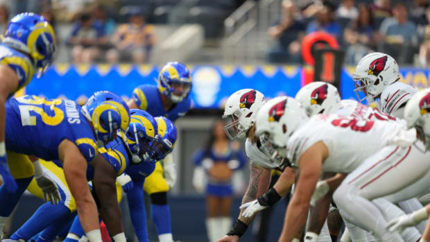 General view of the line of scrimmage as Arizona Cardinals guard Hjalte Froholdt (72) prepares to snap the football against the Los Angeles Rams during the first quarter at SoFi Stadium.